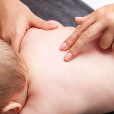 Adjusting baby's back